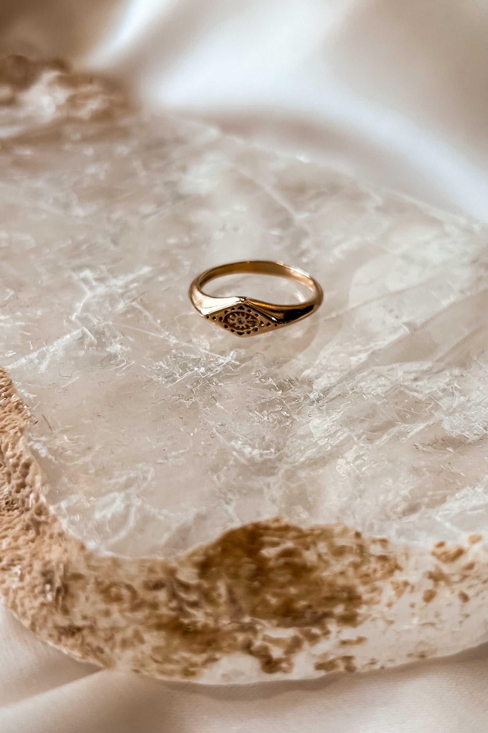 Shine bright like a star with our NORTH STAR RING. This gold plated ring features a stunning star design that will add a touch of celestial charm to any outfit. Sized for the perfect fit. Don't just wear jewelry, reach for the stars!