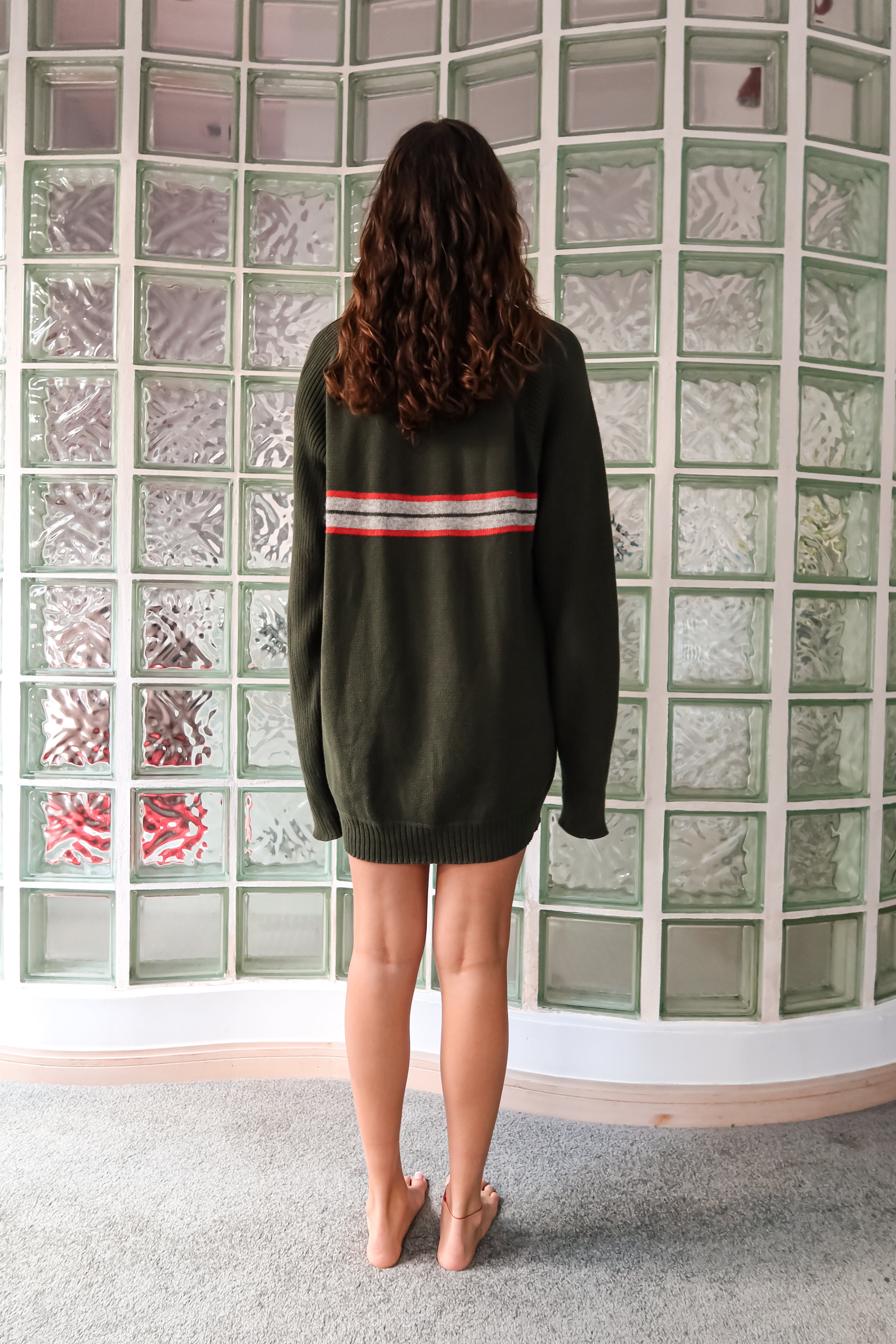 Introducing the CANES CLASSROOM VINTAGE SWEATER! This Tommy Hilfiger 90's V neck sweater features a comfortable stretchy fabric for a good oversize fit. Made with 100% cotton, and the Hilfiger label intact, this vintage piece fits sizes S-L. Stay warm this semester, Miami AC's are very cold!