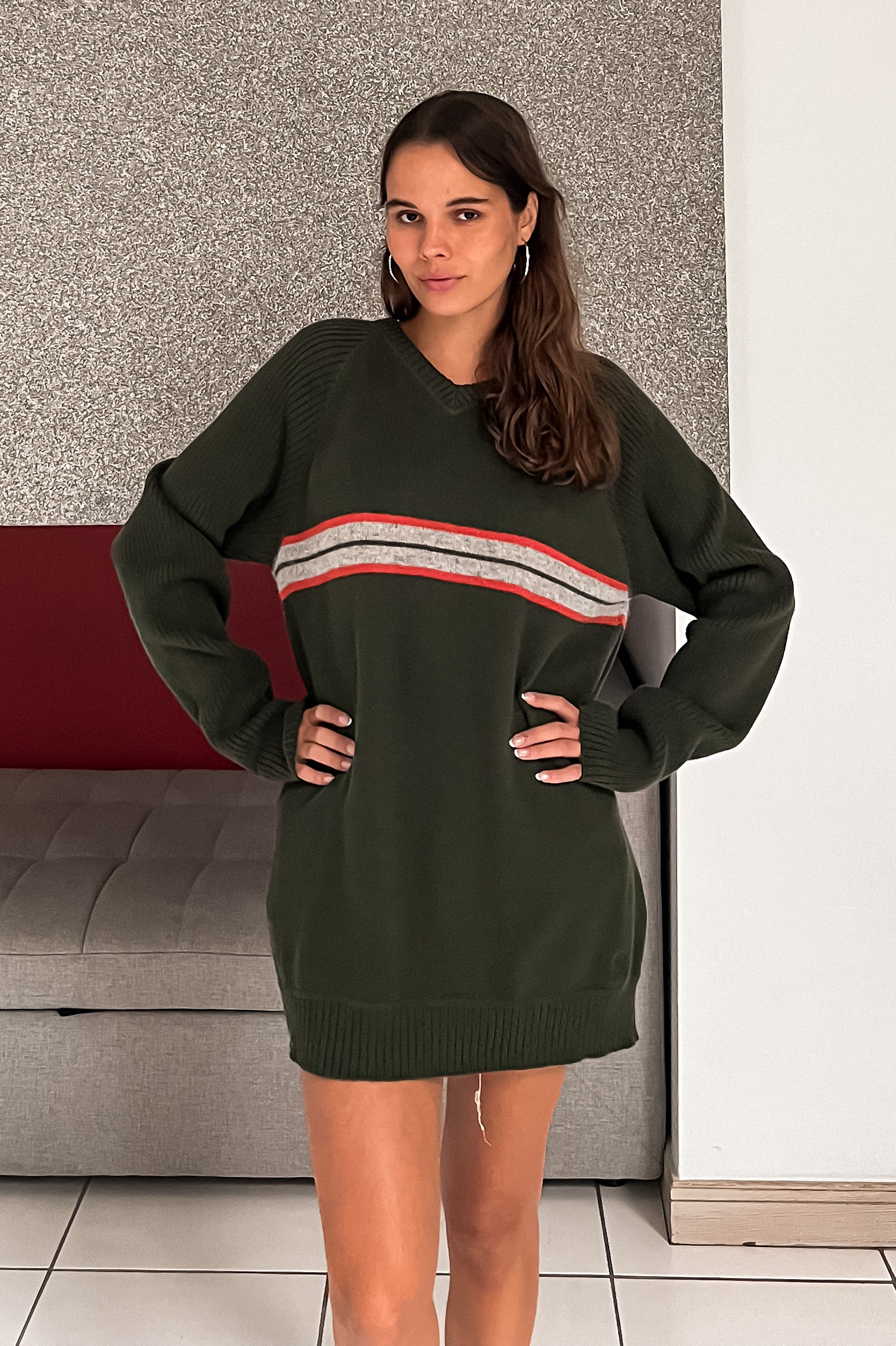 Introducing the CANES CLASSROOM VINTAGE SWEATER! This Tommy Hilfiger 90's V neck sweater features a comfortable stretchy fabric for a good oversize fit. Made with 100% cotton, and the Hilfiger label intact, this vintage piece fits sizes S-L. Stay warm this semester, Miami AC's are very cold!