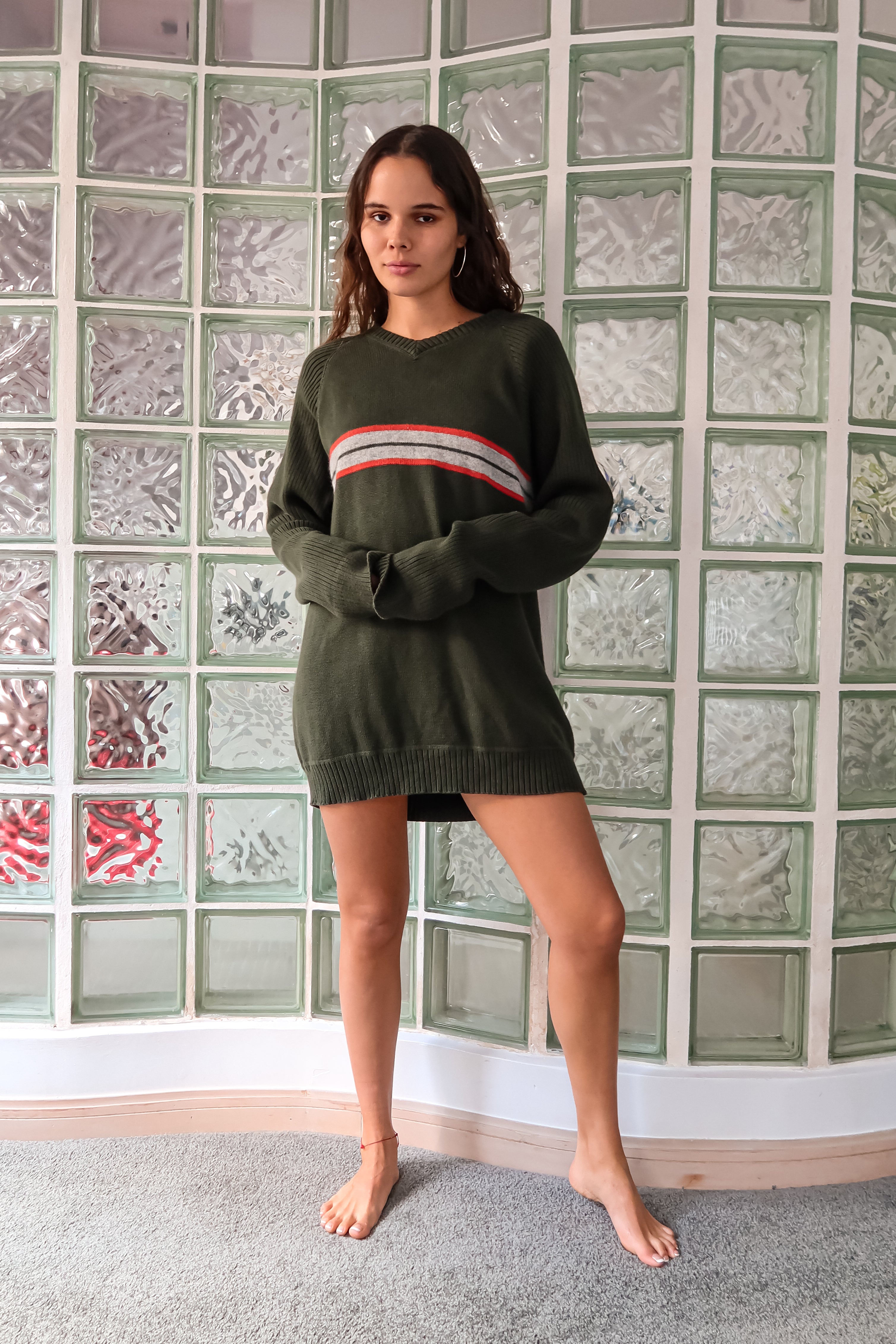Introducing the CANES CLASSROOM VINTAGE SWEATER! This Tommy Hilfiger 90's V neck sweater features a comfortable stretchy fabric for a good oversize fit. Made with 100% cotton, and the Hilfiger label intact, this vintage piece fits sizes S-L. Stay warm this semester, Miami AC's are very cold!