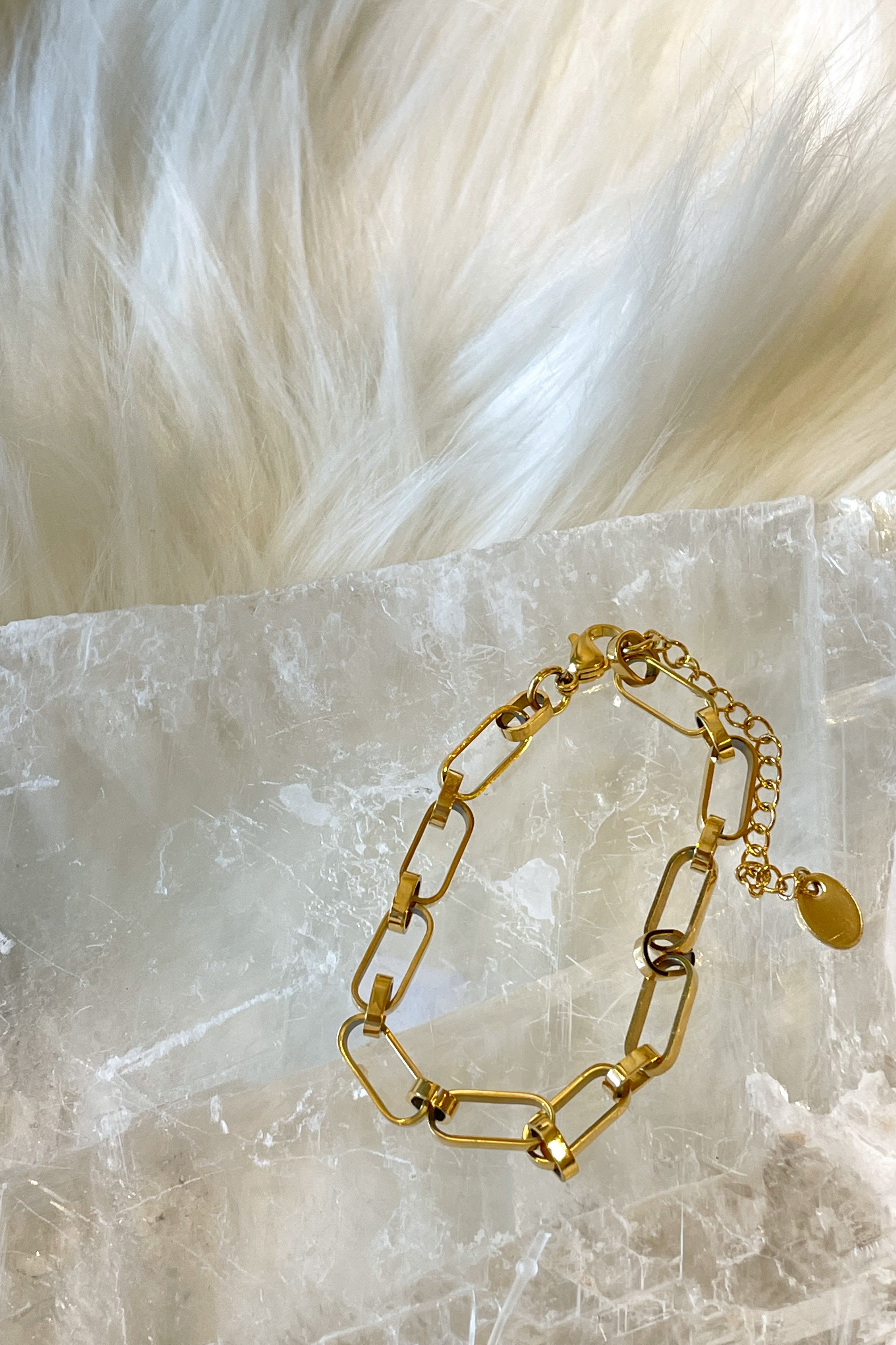 Unleash infinite style with our SS ETERNITY LINK BRACELET. This gold adjustable bracelet, with a 7 inch length and 2 inch extender, is made of stainless steel to ensure it won't turn color or tarnish.