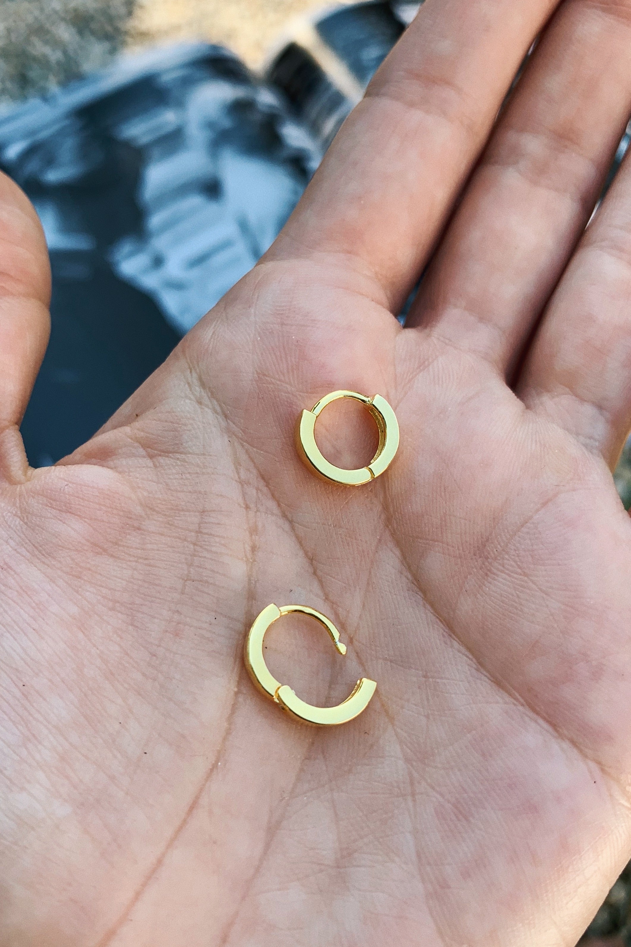 Add some glamour without the irritation! GP HOOP HUGGIES are hypoallergenic and perfect for sensitive ears. Made with gold plated 925 sterling silver, these mini hoops will elevate any look.