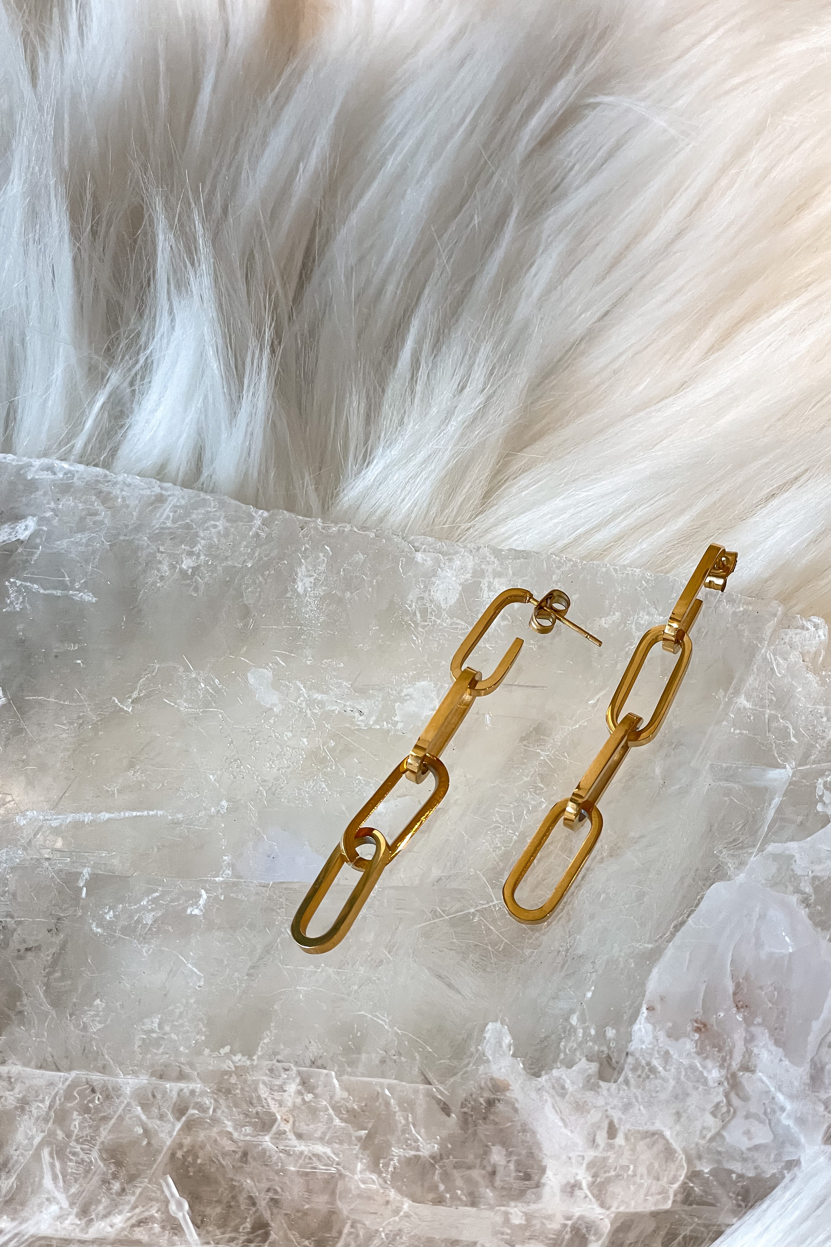 Put a stylish spin on your earring game with our SS Paperclip Earrings! Featuring a unique paperclip link design, these drop earrings will add a touch of edgy charm to any outfit. Plus, with a push back post closure and durable stainless steel construction, these 2 1/2 inch long earrings are sure to stay shining and bright - no tarnishing here!