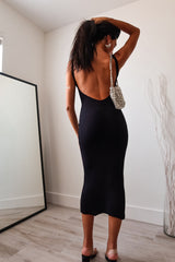 Go from day to night effortlessly with this ribbed midi dress! Featuring a boat neck front and low back, this bodycon dress hugs your curves in all the right places. Perfect for any occasion, this dress will have you turning heads wherever you go. 