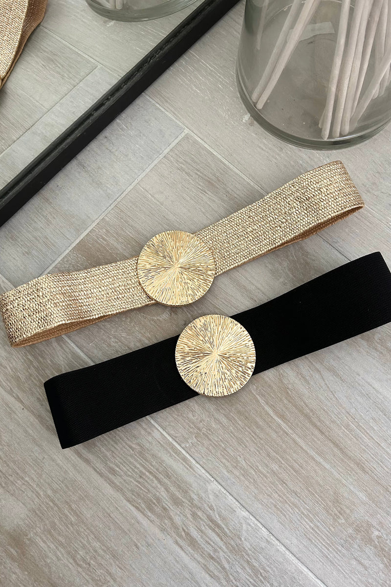 Add some shine to your outfit with our Gold Circle Stretch Belt! Made with a comfortable stretch material, this belt includes a playful gold circle buckle. Available in both black and gold, it's the perfect accessory for any look.