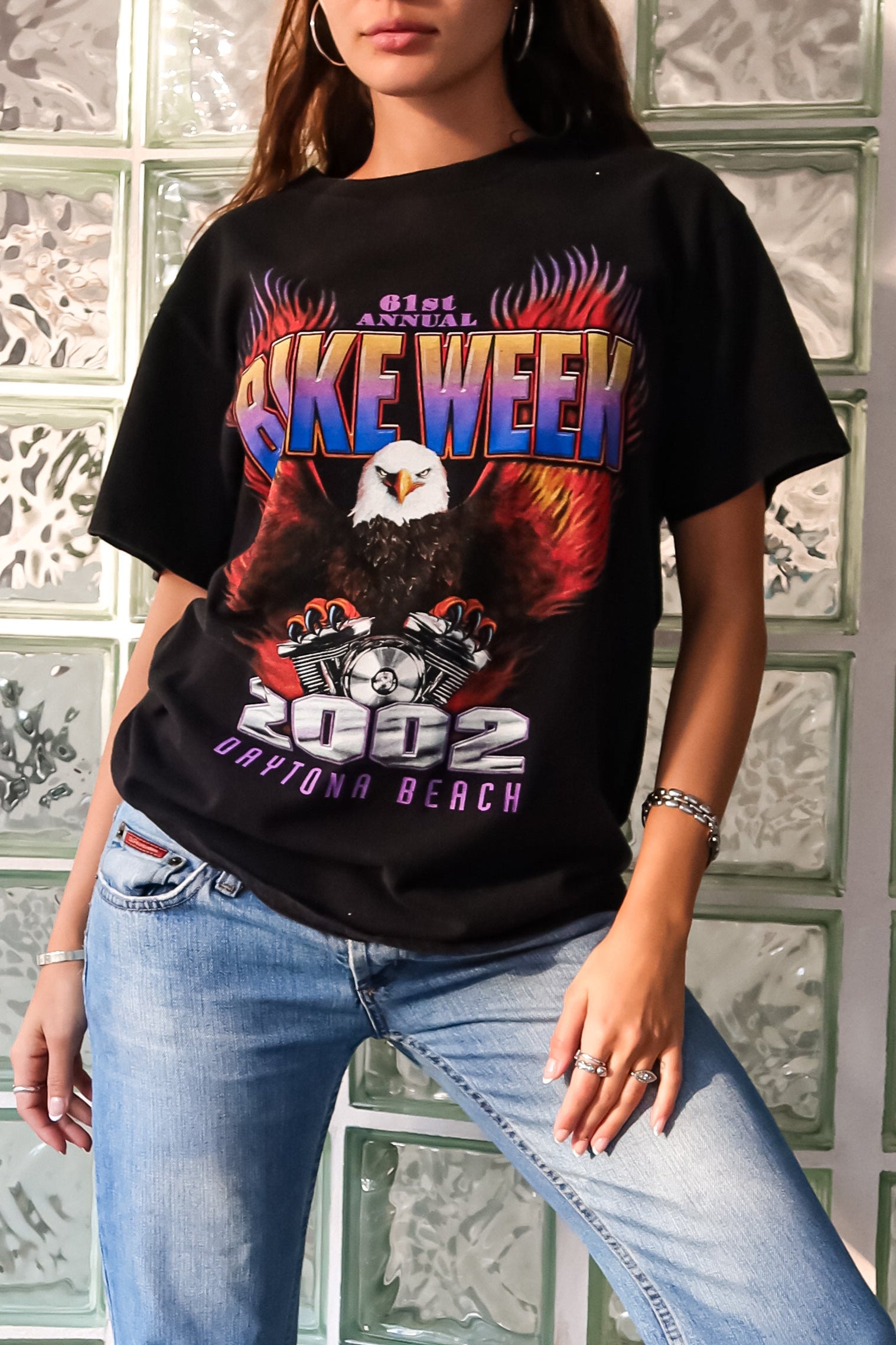 Get ready to hit the streets in style with our BIKE WEEK DAYTONA 2002 VINTAGE TEE! This one-of-a-kind t-shirt features a unique black design for both the front and back, made from 100% cotton for a comfortable fit. Perfect for sizes S-L, this tee is sure to add some vintage flair to your wardrobe.