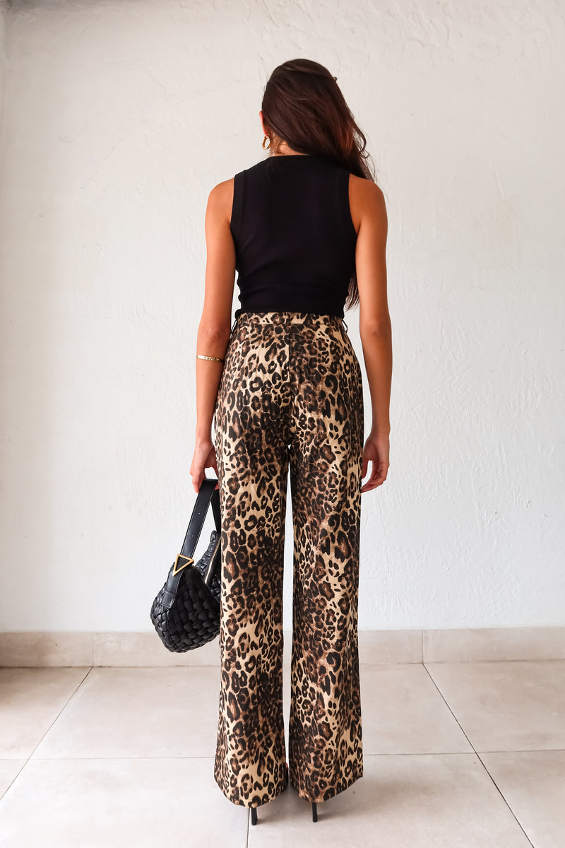 Unleash your wild side with our PROWL JEANS. These cheetah denim jeans feature a flattering wide leg and high waist for a fierce look. With a button zipper closure, front pockets, and belt loops, these jeans are both stylish and functional. Take a walk on the wild side!