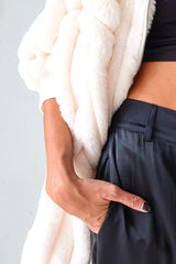 Get cozy and chic with our TIMES SQUARE FAUX FUR JACKET! Made from white faux fur, this cruelty-free jacket features a collared neckline and front zipper closure for a touch of edge. The lining and bottom stretch provide ultimate comfort while ensuring a perfect fit.