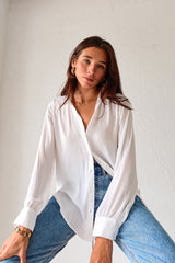 Put a playful twist on your classic work attire with our GABLES LONG SLEEVE BLOUSE. This white, non-lined button down blouse is both lightweight and comfortable for all-day wear. With long sleeves and button wrists, this blouse is perfect for any season. Don't settle for boring office wear, stand out in style!