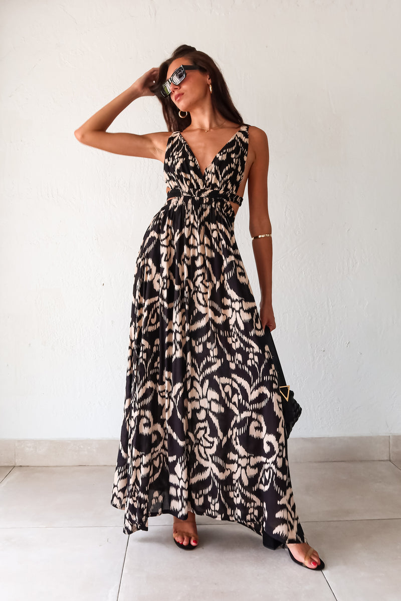 Go with the flow in our NOMAD HEART MAXI DRESS. Featuring a chic Black/Oatmeal design, this dress has a button triangle top for a customizable fit and an elastic waist band for all-day comfort. With an elastic stretchy backing, you'll feel effortlessly stylish and ready to conquer the day.