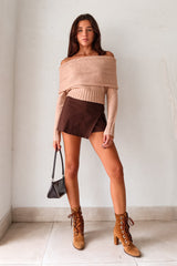 Stay cozy and stylish all season long with our Aspen Sweater! This tan long sleeve sweater features a unique foldover design, ribbed wrist and torso for a snug fit, and stretchy fabric for ultimate comfort. Perfect for any occasion, whether you're out and about or lounging at home.