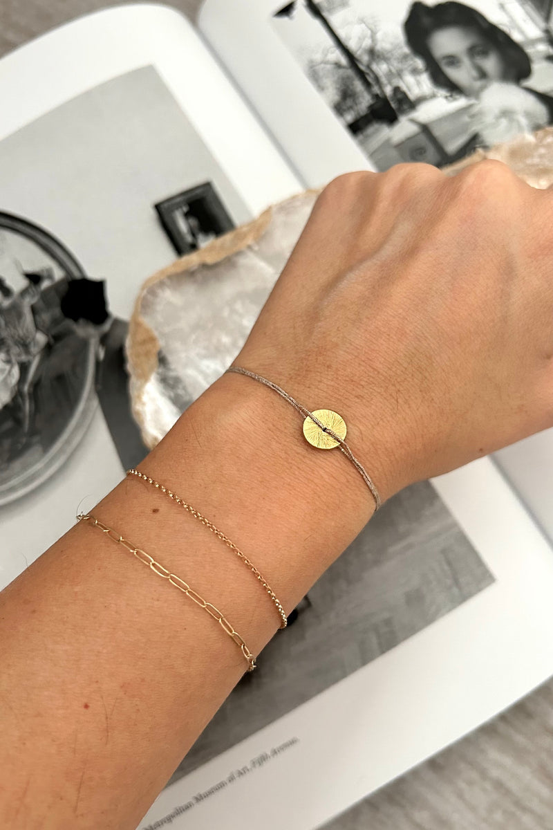 Introducing our SD Rose Bracelet - the perfect accessory for any occasion! Made with a gold plated over sterling silver charm and a sturdy rope bracelet, this piece is both tarnish resistant and hypoallergenic. Express your style with confidence knowing this bracelet will stay shining for every wear.