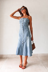 Get ready to rock a laid-back look with our Cypress Denim Midi Dress. This versatile piece features a front button down closure and adjustable shoulder straps for a customizable fit. The stretchy fabric and smocked backing provide ultimate comfort, while the chest stitch detail adds a touch of unique style. Non lined for a lightweight feel.