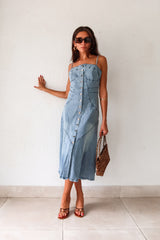 Get ready to rock a laid-back look with our Cypress Denim Midi Dress. This versatile piece features a front button down closure and adjustable shoulder straps for a customizable fit. The stretchy fabric and smocked backing provide ultimate comfort, while the chest stitch detail adds a touch of unique style. Non lined for a lightweight feel.