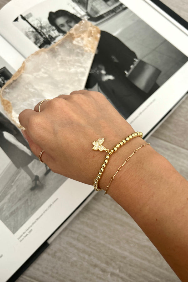 Transform any outfit into a stylish fairytale with our SLAP ON BRACELET PRINCESS. Made with gold plated over sterling silver, the butterfly charm adds a whimsical touch while being tarnish resistant and hypoallergenic for all-day wear.