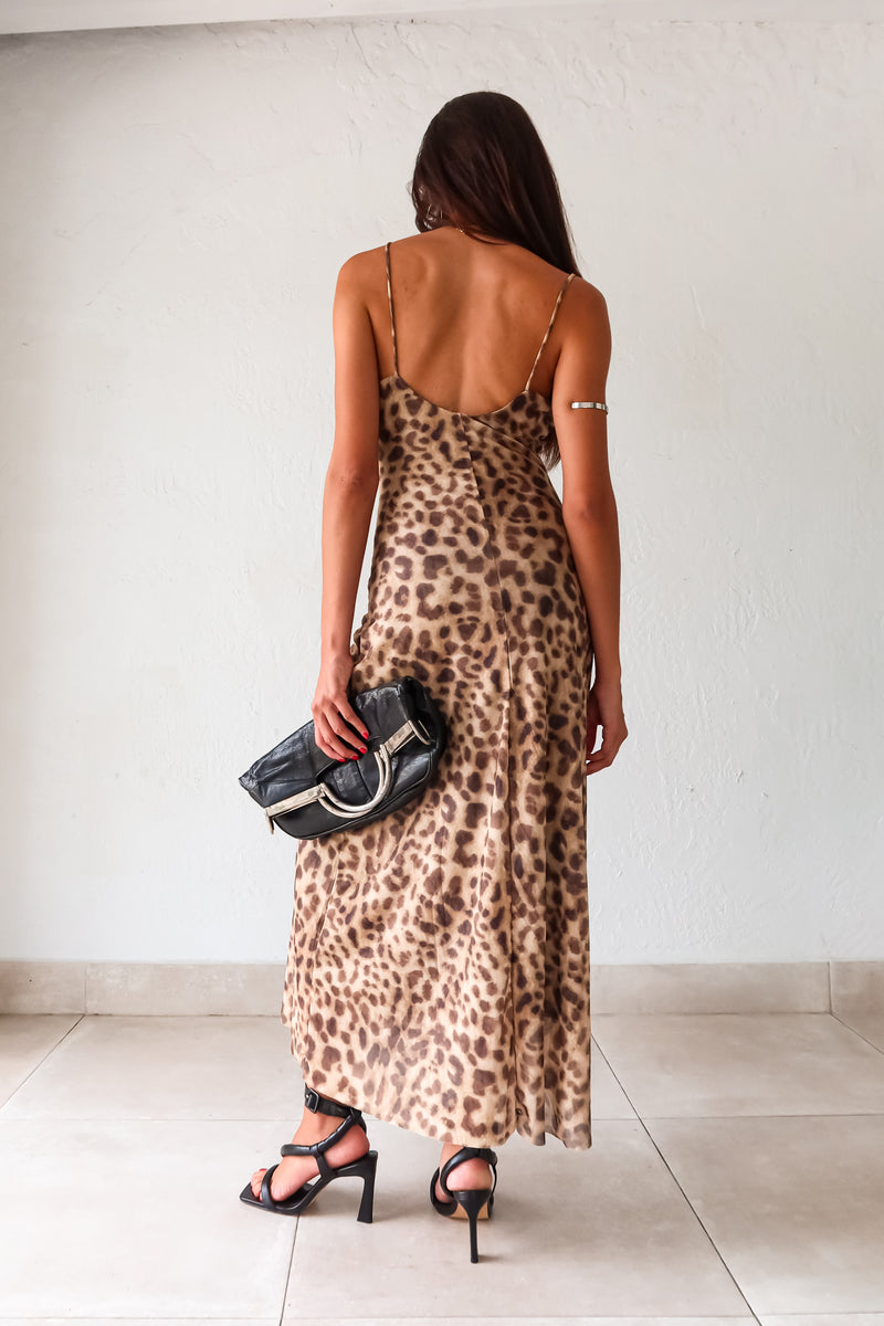 Unleash your wild side with the NAOMI MESH MAXI DRESS. This dress features a fierce cheetah design on a breezy mesh fabric, perfect for showing off your natural beauty. The cowl neck and slight stretch provide a comfortable, yet stylish fit. Embrace your inner fashionista and turn heads wherever you go.