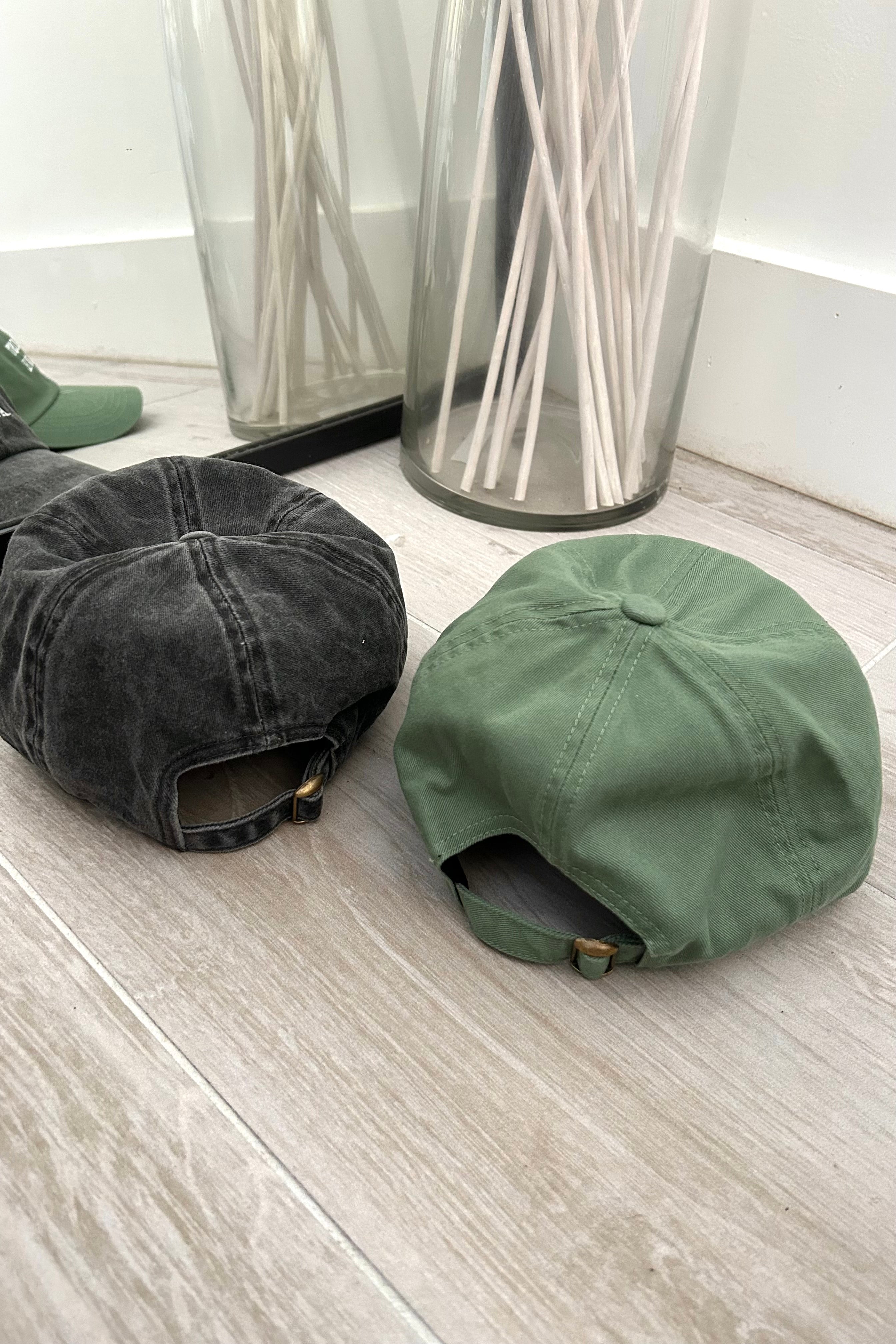 Never lose your tailgate with this playful baseball cap! Available in sage or washed black, this adjustable strap cap is perfect for any size head. Show off your quirky side with the "Never Lost A Tailgate" design. Don't worry, we got you covered!