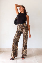 Unleash your wild side with our PROWL JEANS. These cheetah denim jeans feature a flattering wide leg and high waist for a fierce look. With a button zipper closure, front pockets, and belt loops, these jeans are both stylish and functional. Take a walk on the wild side!