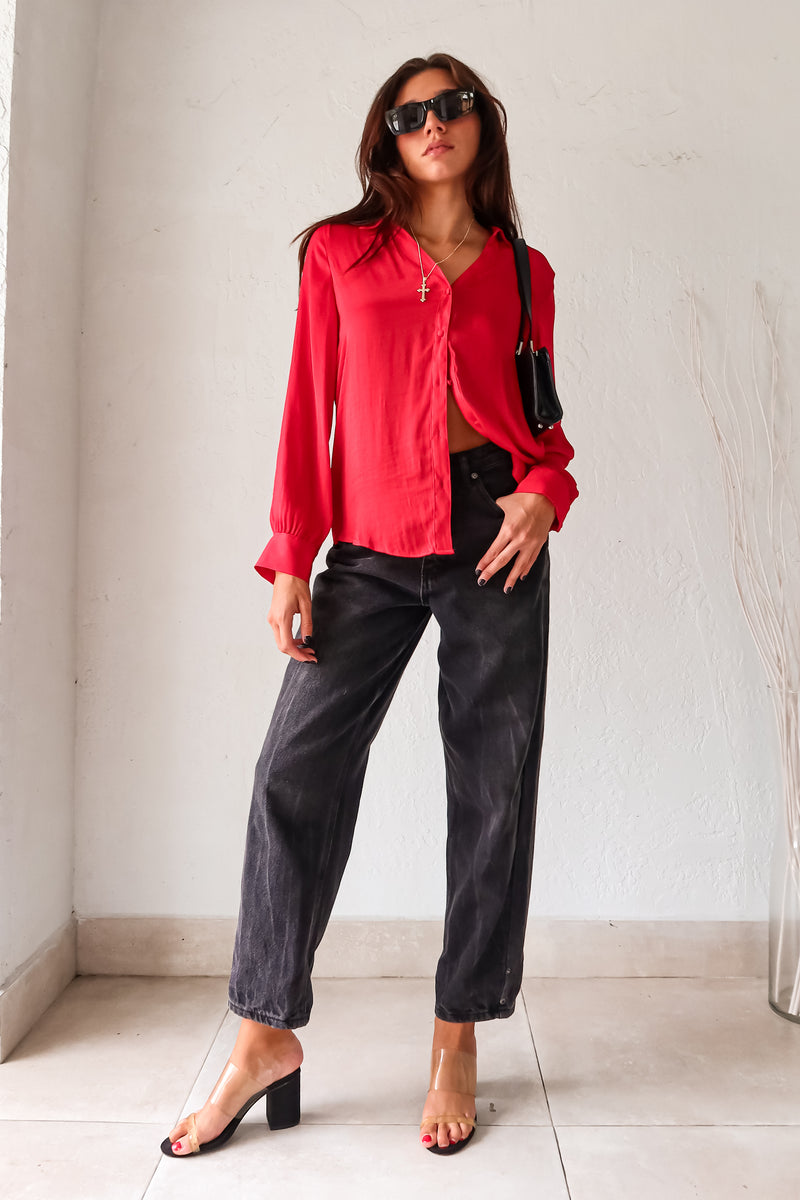 Put a playful twist on your classic work attire with our GABLES LONG SLEEVE BLOUSE. This red, non-lined button down blouse is both lightweight and comfortable for all-day wear. With long sleeves and button wrists, this blouse is perfect for any season. Don't settle for boring office wear, stand out in style!