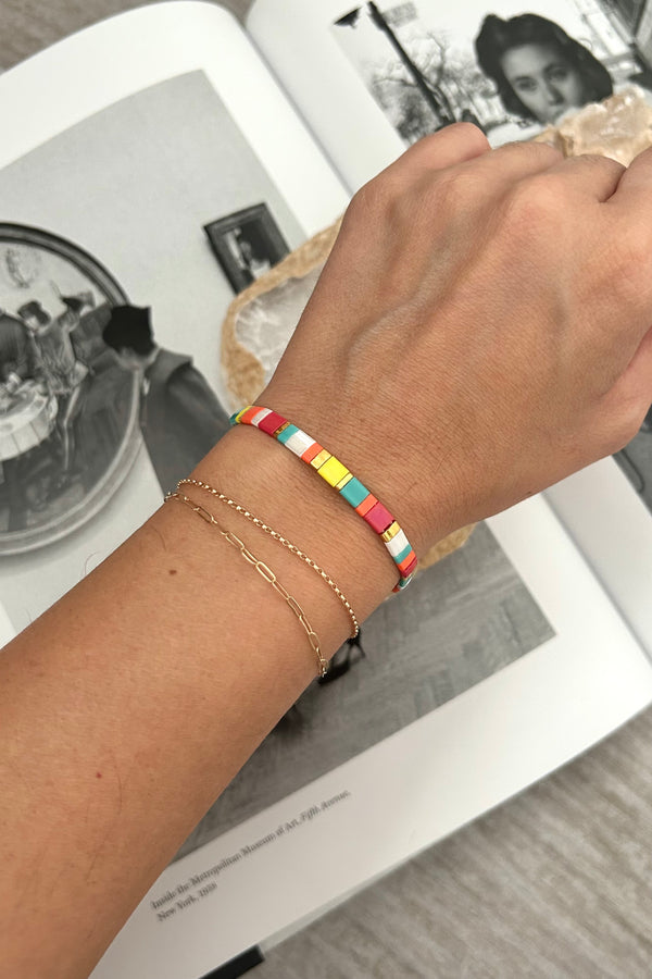 Brighten up any outfit with this playful SD Multi Bracelet! Featuring multi-colored charm rope and boasting tarnish resistance and hypoallergenic properties, this bracelet is perfect for adding a pop of color and style to your look without the worry of discoloration or irritation. Your wrist will thank you!