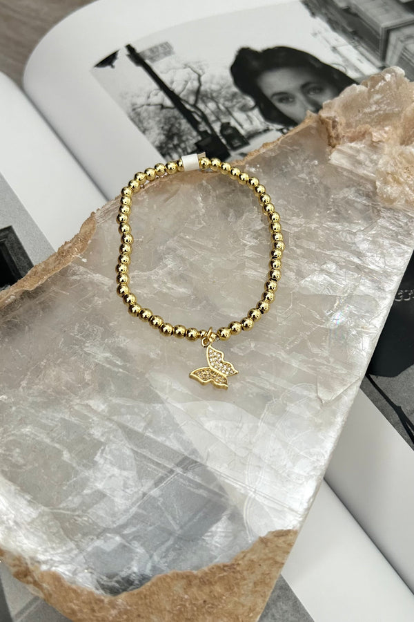 Transform any outfit into a stylish fairytale with our SLAP ON BRACELET PRINCESS. Made with gold plated over sterling silver, the butterfly charm adds a whimsical touch while being tarnish resistant and hypoallergenic for all-day wear.