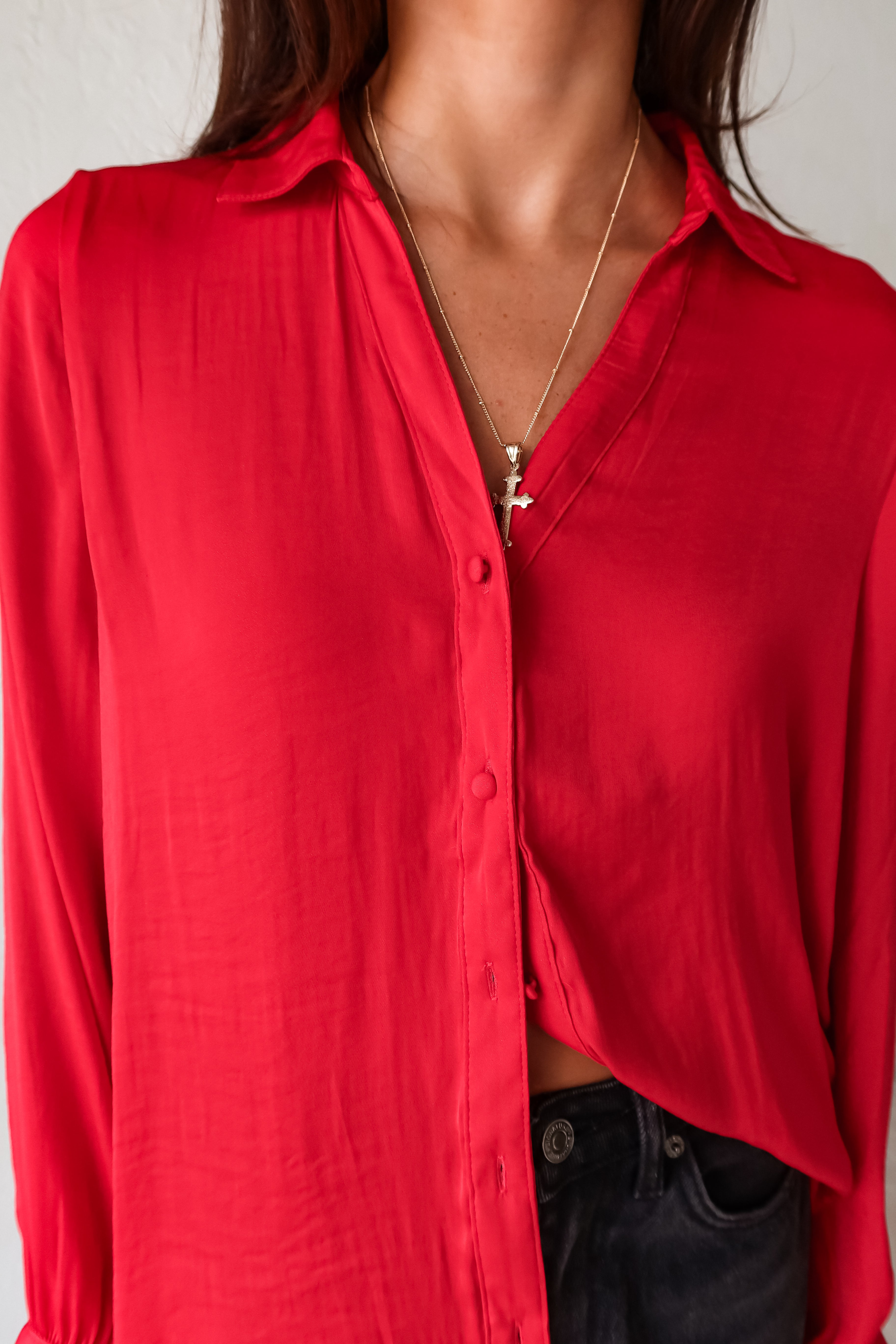 Put a playful twist on your classic work attire with our GABLES LONG SLEEVE BLOUSE. This red, non-lined button down blouse is both lightweight and comfortable for all-day wear. With long sleeves and button wrists, this blouse is perfect for any season. Don't settle for boring office wear, stand out in style!