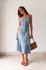 Get ready to rock a laid-back look with our Cypress Denim Midi Dress. This versatile piece features a front button down closure and adjustable shoulder straps for a customizable fit. The stretchy fabric and smocked backing provide ultimate comfort, while the chest stitch detail adds a touch of unique style. Non lined for a lightweight feel.