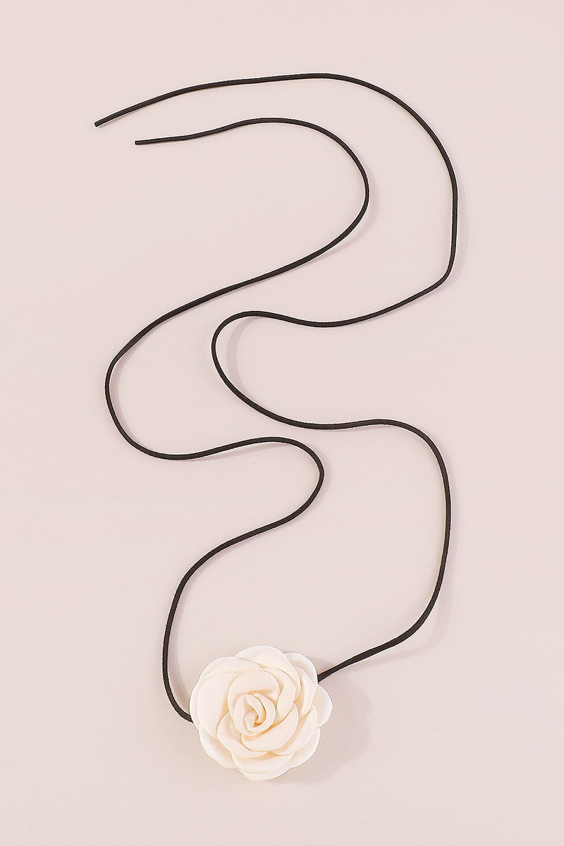 Unleash your inner flower child with our LE FLEUR CHOKER! This choker is the perfect mix of edgy and feminine, featuring a off white flower and black faux suede string. Whether you wear it as a necklace or belt, this versatile piece will add a touch of fun to any outfit.