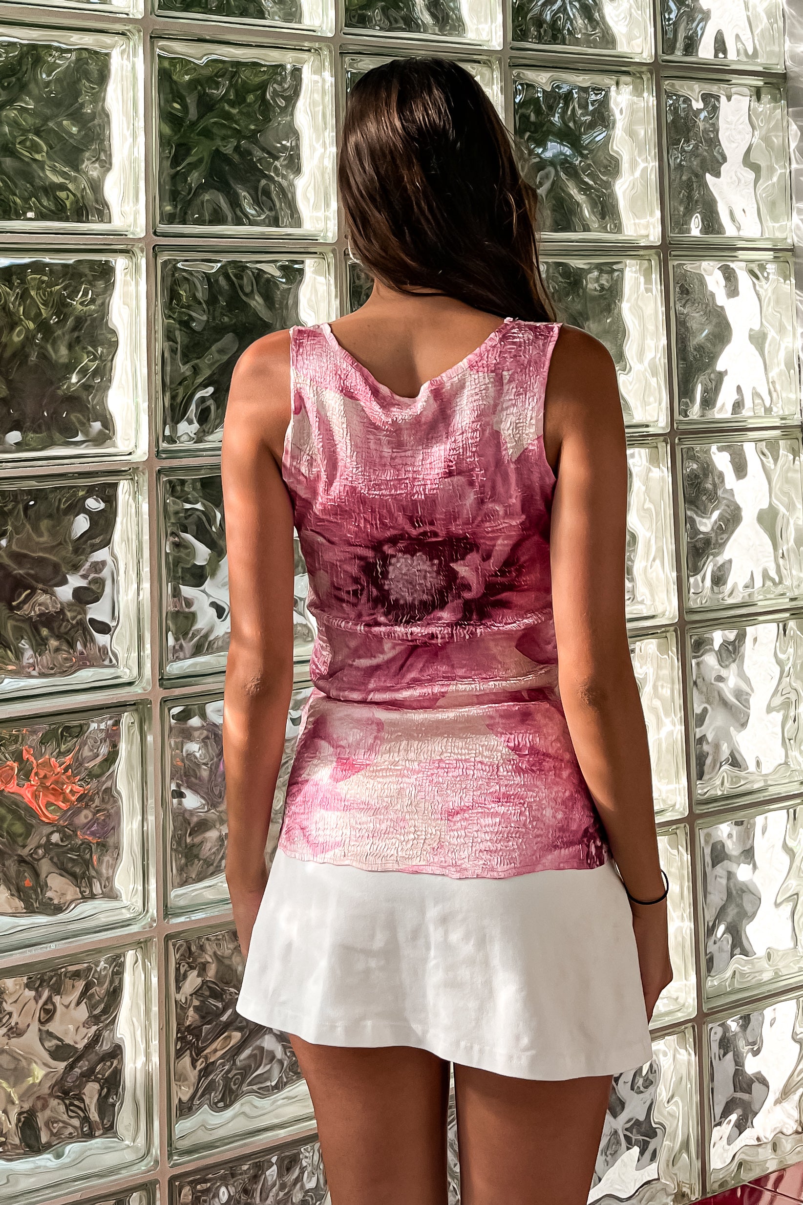 Get ready for the ultimate vintage vibe with our SEASON'S EVE VINTAGE TOP! This Komarov crinkle hand dyed tank features a unique "popcorn" design in pink, white, and burgundy. Non-lined and stretchy, it boasts a lace front shoulder and fits S-L. Perfect for a playful and stylish look.