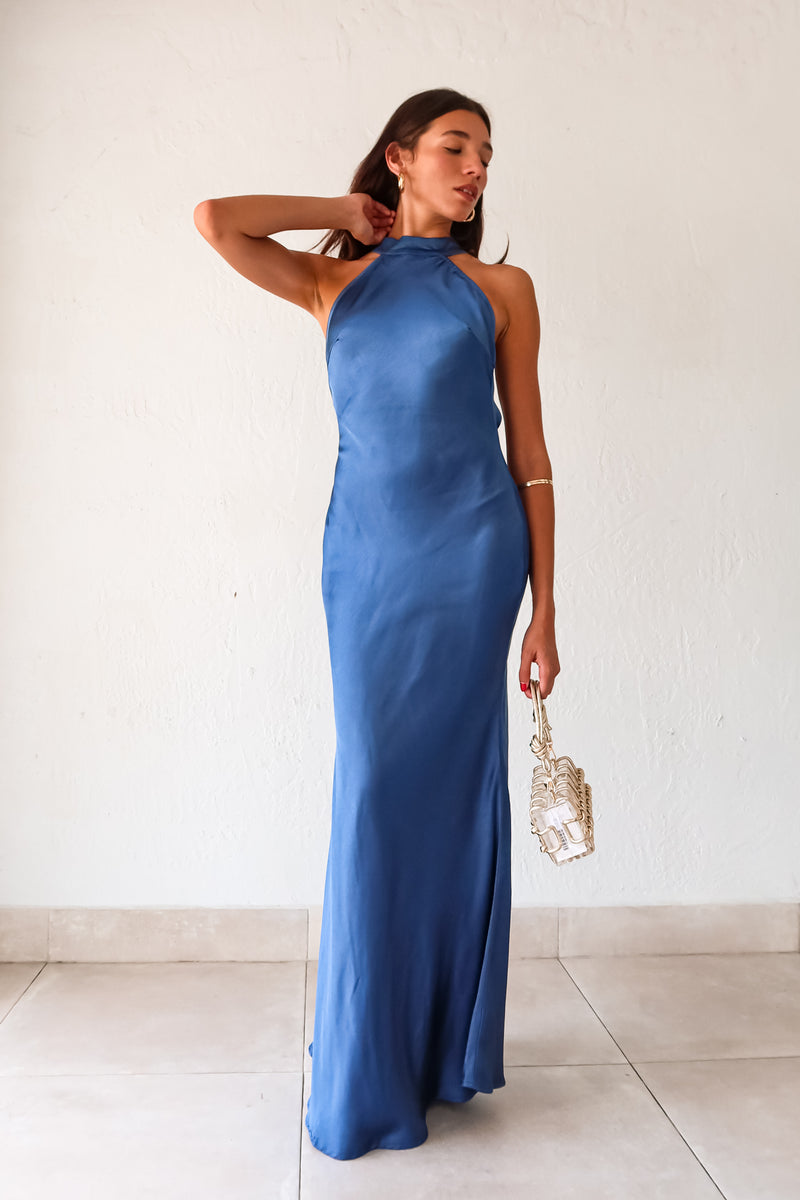 Take your style to the next level with the MAIN EVENT SATIN MAXI DRESS! This luxurious spa blue dress features a high neckline and adjustable tie in the back, perfect for creating a flattering silhouette. The draped back adds a touch of elegance to complete your look. Dress to impress with this stunning piece.