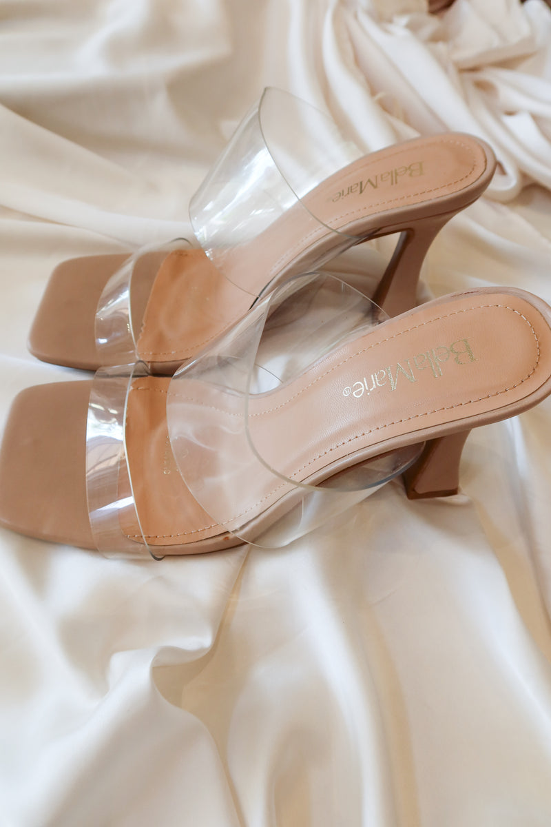 Introducing the NINA CLEAR HEEL - a unique twist on the classic beige leather heel. With a clear strap and 4 inch heel, this shoe offers a comfortable fit with a touch of modernity. Look stylish and feel confident all day long!