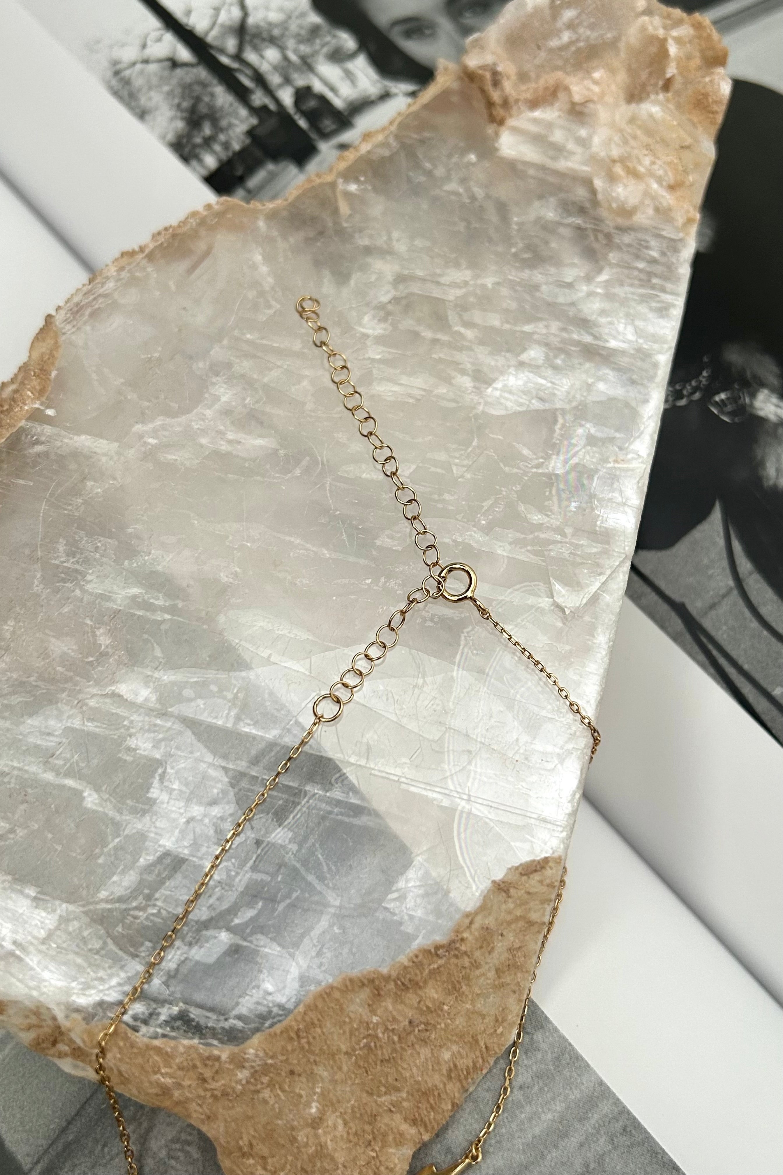 Get struck by style with the BOLT CHOKER! This gold plated choker features a charming lightning bolt detail and is made with tarnish-resistant, hypoallergenic sterling silver. No need to fear an allergic reaction or dull, tarnished jewelry. This choker is sure to add a shock of chic to any outfit.