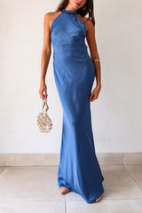 Take your style to the next level with the MAIN EVENT SATIN MAXI DRESS! This luxurious spa blue dress features a high neckline and adjustable tie in the back, perfect for creating a flattering silhouette. The draped back adds a touch of elegance to complete your look. Dress to impress with this stunning piece.