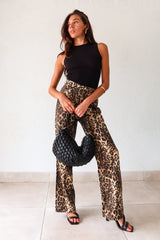 Unleash your wild side with our PROWL JEANS. These cheetah denim jeans feature a flattering wide leg and high waist for a fierce look. With a button zipper closure, front pockets, and belt loops, these jeans are both stylish and functional. Take a walk on the wild side!