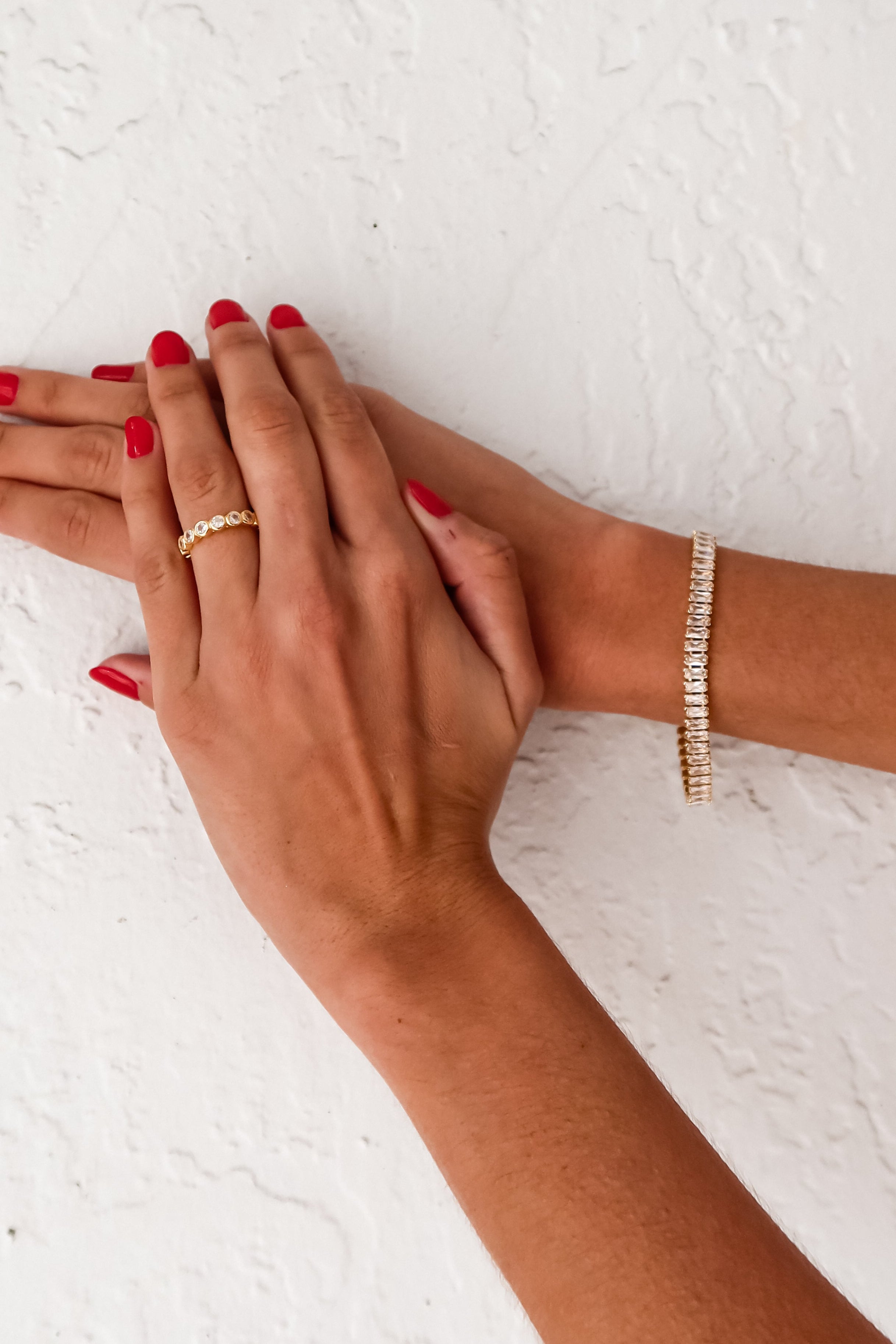 Add a touch of glamour to any outfit with our Rhinestone Ring/Bracelet Collection! Featuring a bezel ring and tennis bracelet plated in gold with stunning rhinestones, these pieces are not only tarnish resistant but hypoallergenic as well. Shine bright and confidently