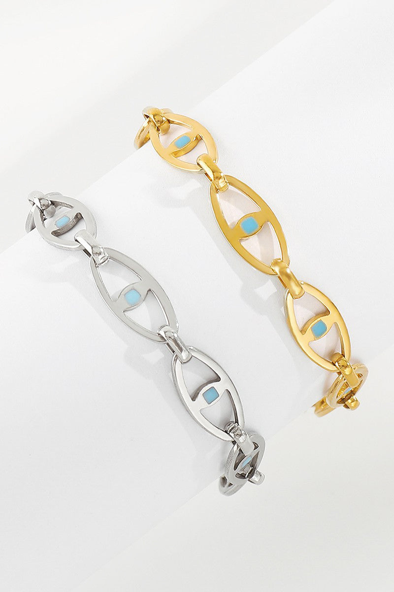 Make a statement with our SS HOLLOW EYE BRACELET - GOLD. This stainless steel bracelet features an evil eye design that is both eye-catching and protective. With tarnish resistant and hypoallergenic properties, this bracelet is perfect for those with sensitive skin. So be bold and stylish without any worries!