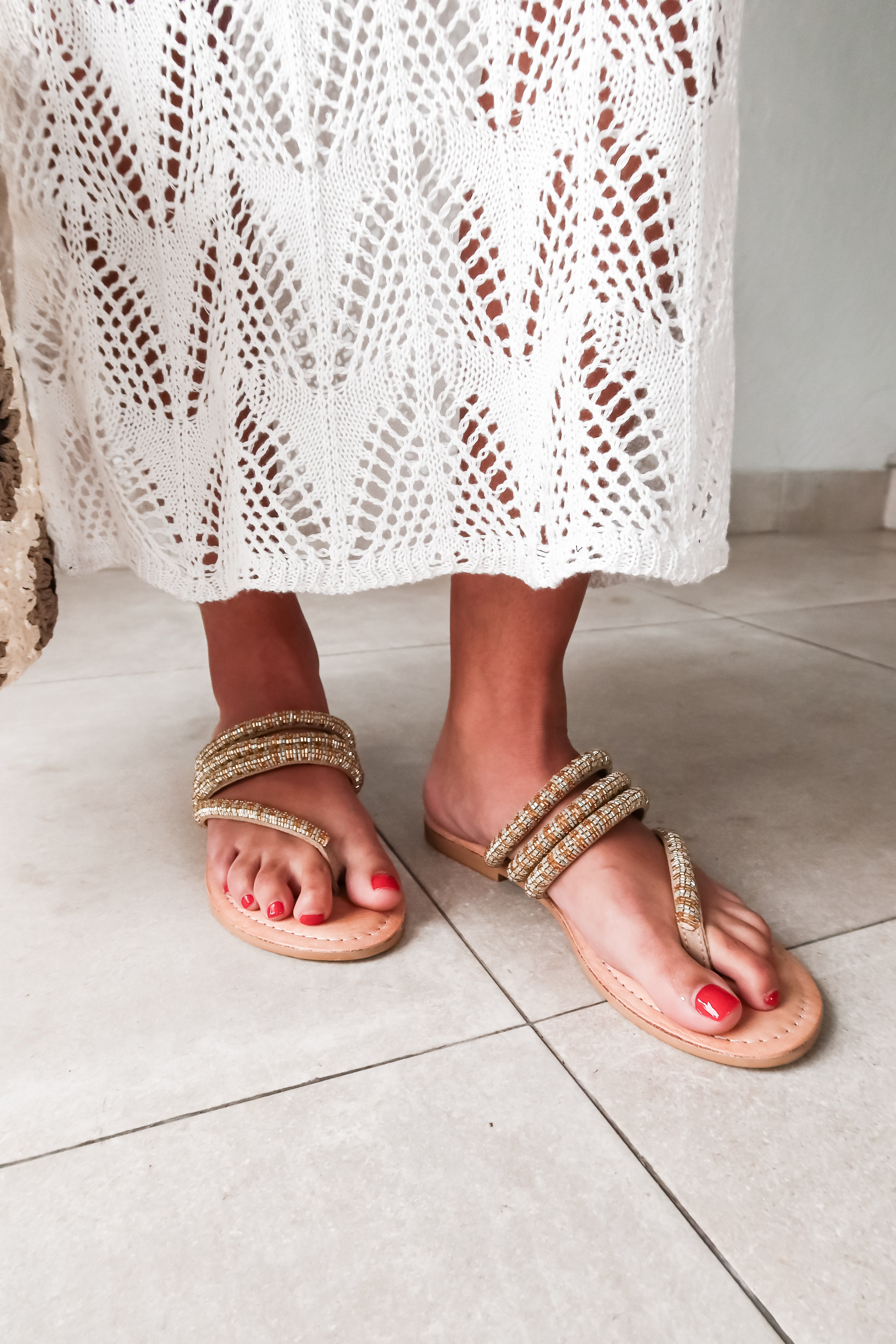 Introducing the DARLY BEADED LEATHER SANDAL – the perfect combination of style and compassion. Our cruelty-friendly leather is hand beaded into a playful strap sandal, making a statement for both fashion and animal welfare. Step into these quirky sandals and make a unique statement with every step.