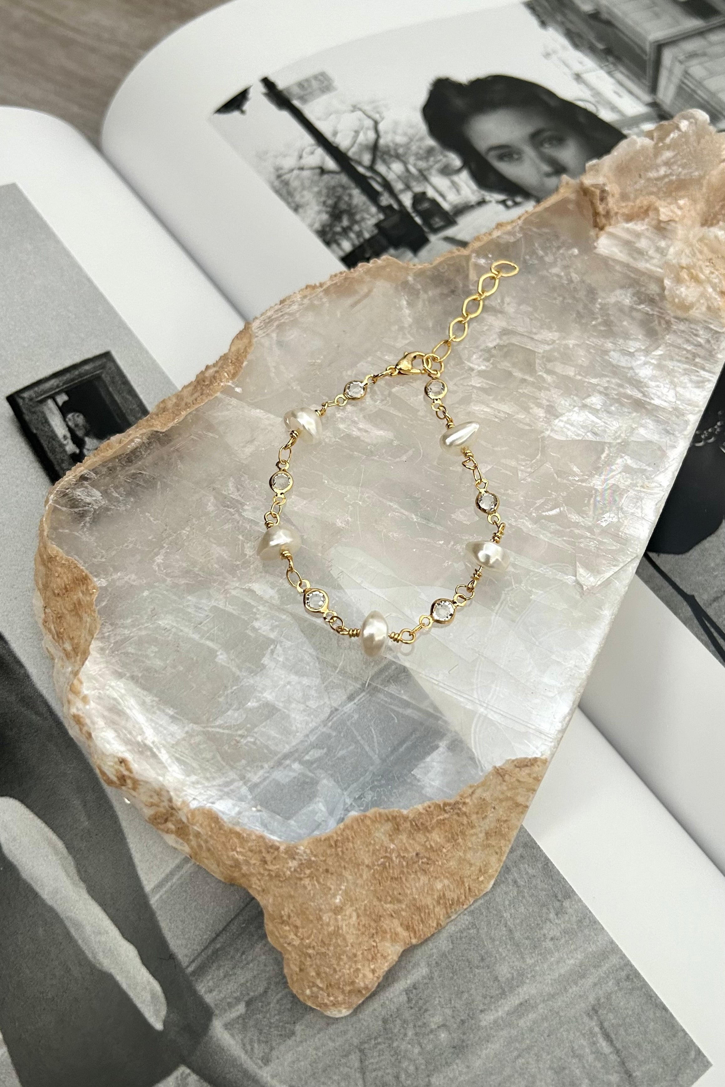 Add a touch of elegance with our Hampton Pearl Bracelet. This gold plated over sterling silver bracelet features pearl bead detailing and is tarnish resistant and hypoallergenic. Stay stylish and comfortable all day long!