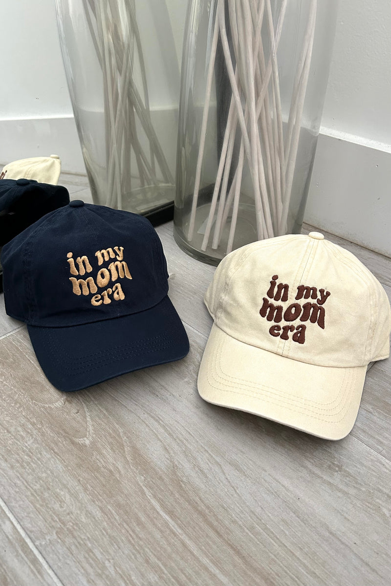 This trendy baseball cap is a must-have for any mom! With its Mom Era design available in both navy and khaki, this cap is the perfect accessory to show off your stylish and playful side. The adjustable strap ensures a perfect fit for all, making it a versatile addition to any wardrobe.