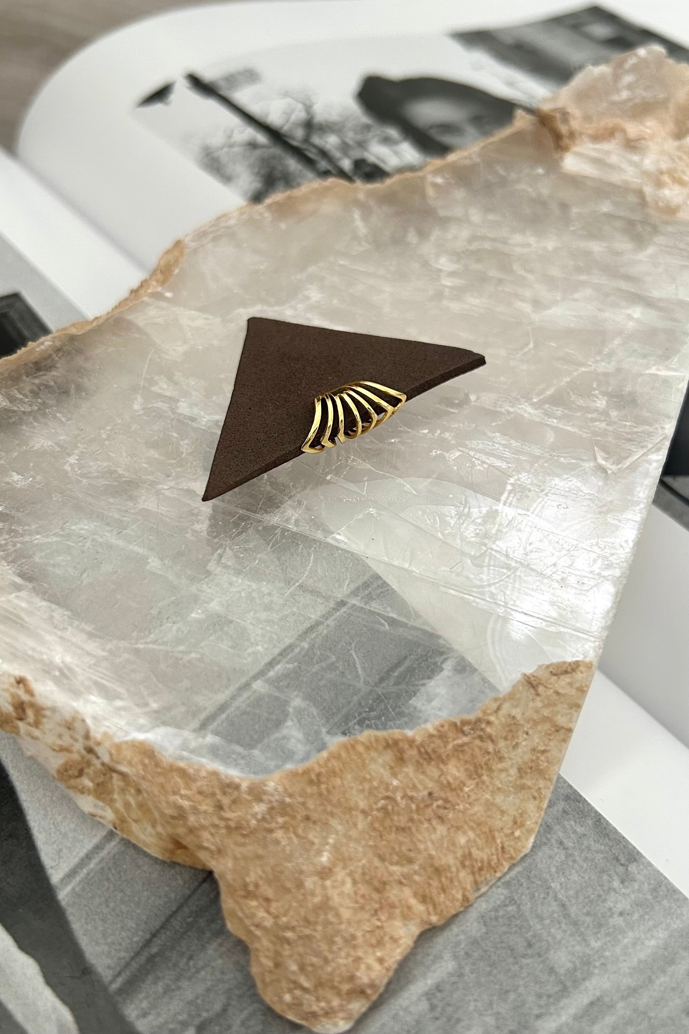 Add a little flare to your jewelry collection with our VIBRATIONS EAR CUFF. Made of gold plated over sterling silver, this ear cuff is not only stylish, but also tarnish resistant and hypoallergenic.