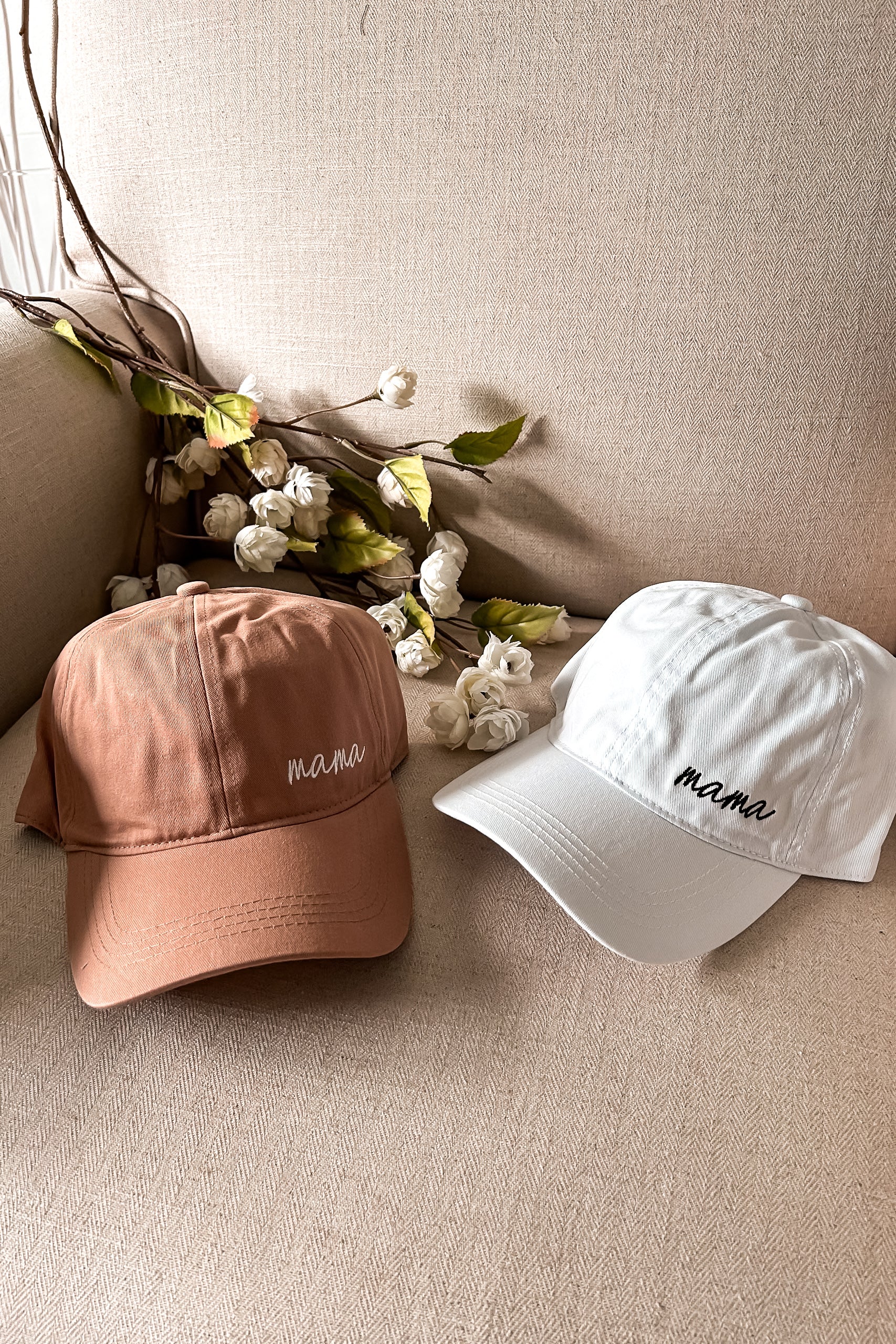 Get ready to rock the ultimate mom accessory with our MAMA BASEBALL CAP! Available in classic white or tan, this cap features a stylish Mama design and an adjustable strap for the perfect fit. One size fits all, making it the perfect addition to any stylish mama's wardrobe.