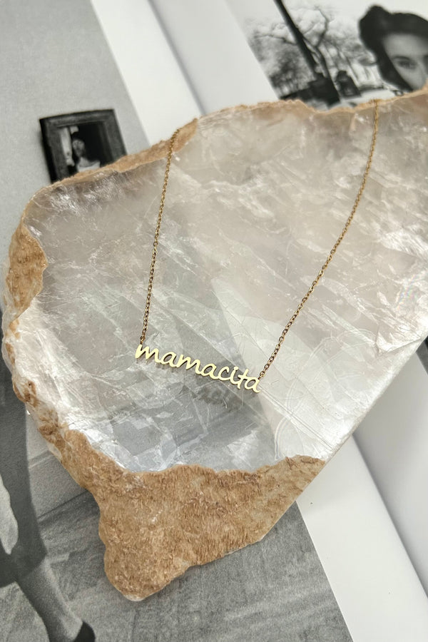 This gold plated necklace with a Mamacita charm is as irresistible as it sounds. Made with sterling silver, it's both tarnish resistant and hypoallergenic, making it the perfect accessory for any occasion. Siesta or fiesta, you'll shine!