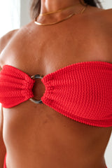 Get ready to shine in the RIALTO ONE SIZE BIKINI SET! Made in Miami by ALILA swim, this crinkle cherry red bikini set features a tortoise ring strapless top and moderate coverage bottoms. With a size range of S - L, this versatile set can be worn high on the leg or lower for your desired look.