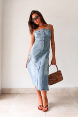 Get ready to rock a laid-back look with our Cypress Denim Midi Dress. This versatile piece features a front button down closure and adjustable shoulder straps for a customizable fit. The stretchy fabric and smocked backing provide ultimate comfort, while the chest stitch detail adds a touch of unique style. Non lined for a lightweight feel.