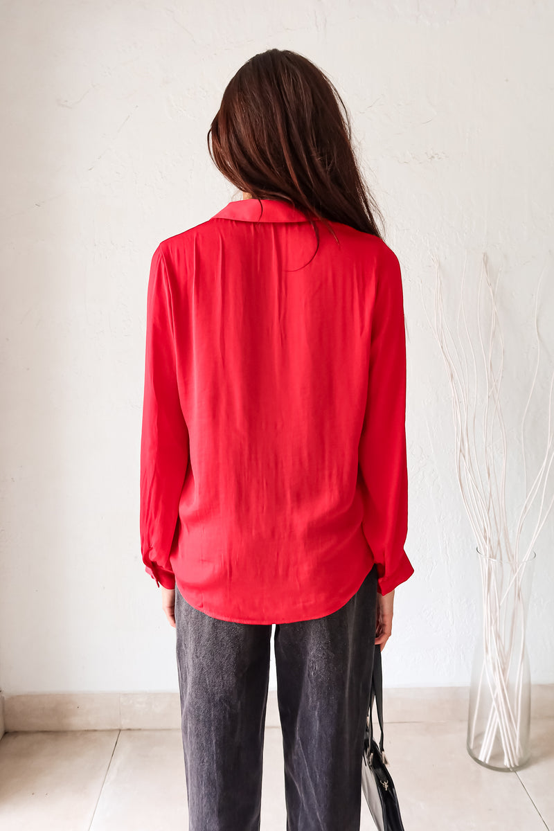 Put a playful twist on your classic work attire with our GABLES LONG SLEEVE BLOUSE. This red, non-lined button down blouse is both lightweight and comfortable for all-day wear. With long sleeves and button wrists, this blouse is perfect for any season. Don't settle for boring office wear, stand out in style!