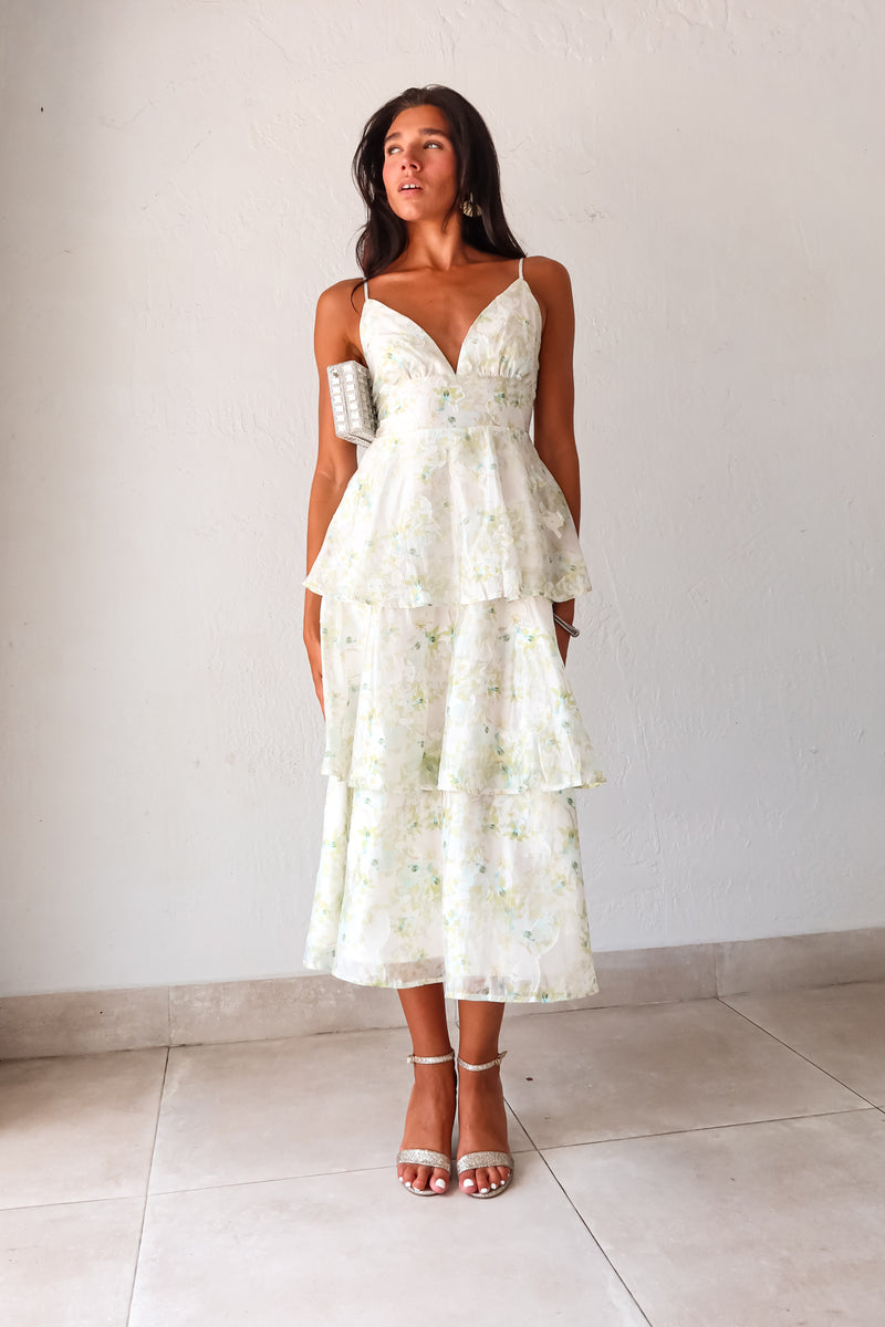 Get ready to bloom in the GARDEN PARTY CHIFFON MIDI DRESS. This romantic dress features a delicate pastel floral print on flowy chiffon, perfect for a party day or night. The tiered design adds a flirty touch while the adjustable shoulder straps and back zipper make for a comfortable fit. Non-stretch and lined for a polished look. 