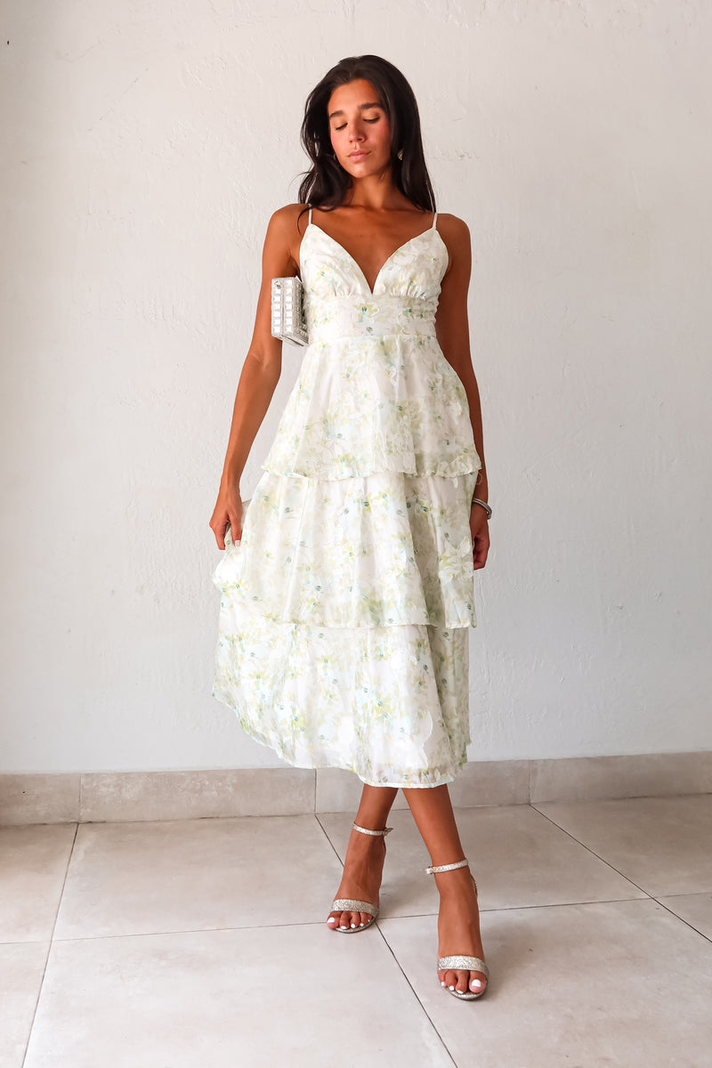 Get ready to bloom in the GARDEN PARTY CHIFFON MIDI DRESS. This romantic dress features a delicate pastel floral print on flowy chiffon, perfect for a party day or night. The tiered design adds a flirty touch while the adjustable shoulder straps and back zipper make for a comfortable fit. Non-stretch and lined for a polished look. 