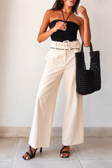 Unleash your inner fashionista with our Napoli Belted Linen Pant! In a chic cream color with contrasting black trim at the waistline, these pants will elevate any outfit. Complete with front pockets, zipper button closure, and an optional belt, these non-stretch, non-lined pants run true to size. Hand wash cold and pair them with the Eclipse Knit Top and Silvana Woven Tote for a stylish, effortless look.