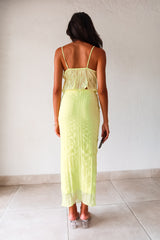 The LUELLA PLISSE CHIFFON SKIRT SET in fluorescent yellow/green is sure to make a statement. The crop top features adjustable shoulder straps and is lined at the bust for added comfort. The midi skirt has an elastic waistband and is also lined. Perfect for a fun and playful look. Hand wash cold.