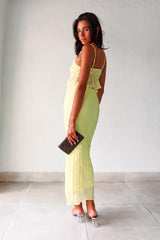 The LUELLA PLISSE CHIFFON SKIRT SET in fluorescent yellow/green is sure to make a statement. The crop top features adjustable shoulder straps and is lined at the bust for added comfort. The midi skirt has an elastic waistband and is also lined. Perfect for a fun and playful look. Hand wash cold.